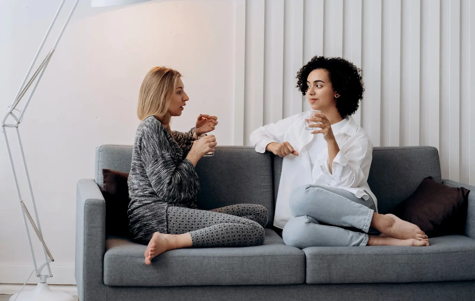 Two friends having an open conversation at home