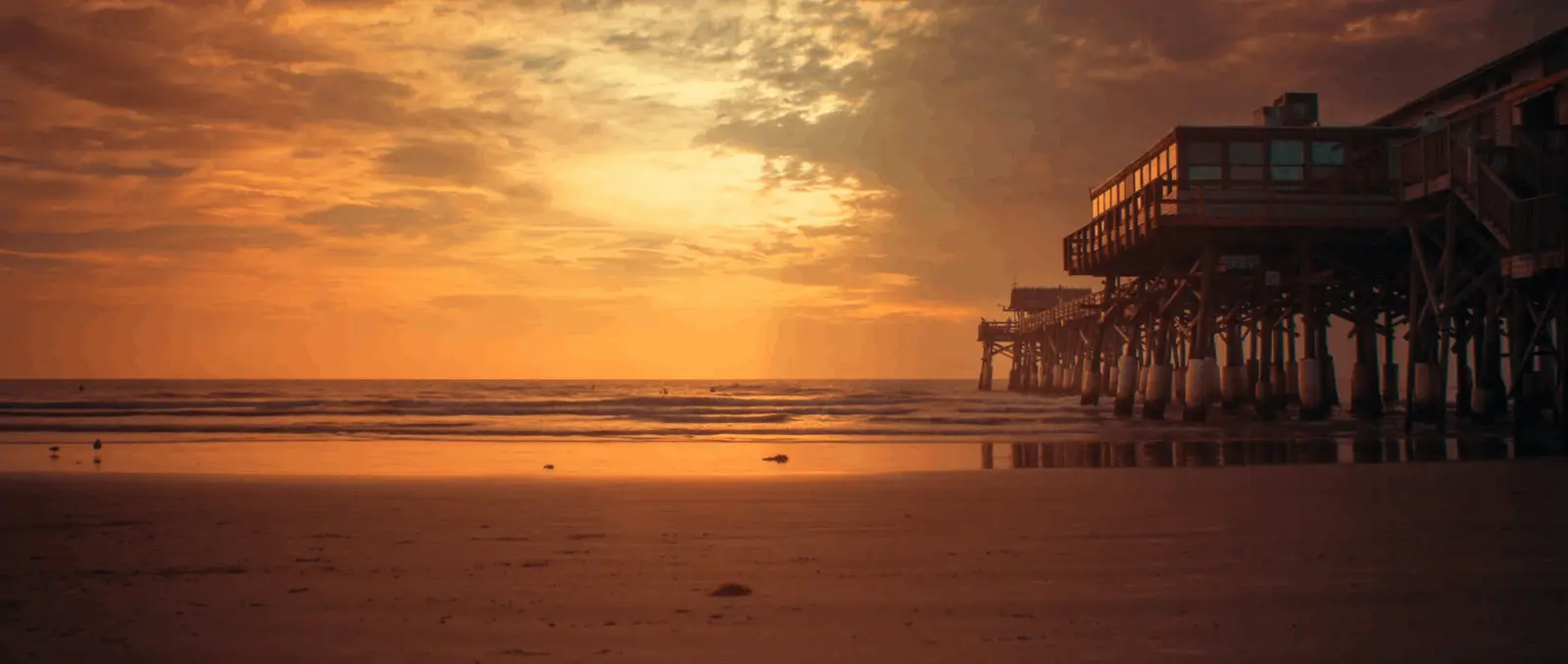 A quiet pier on the Florida coast at sunset