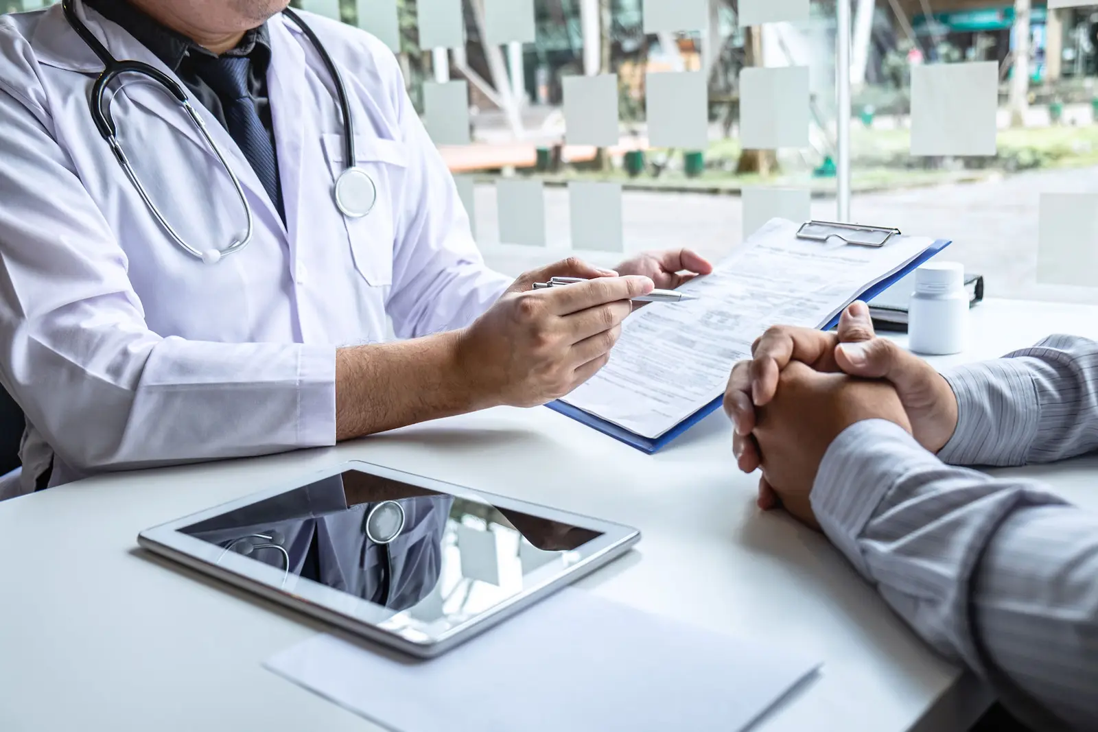 A doctor reviewing a benzodiazepine treatment plan with a patient