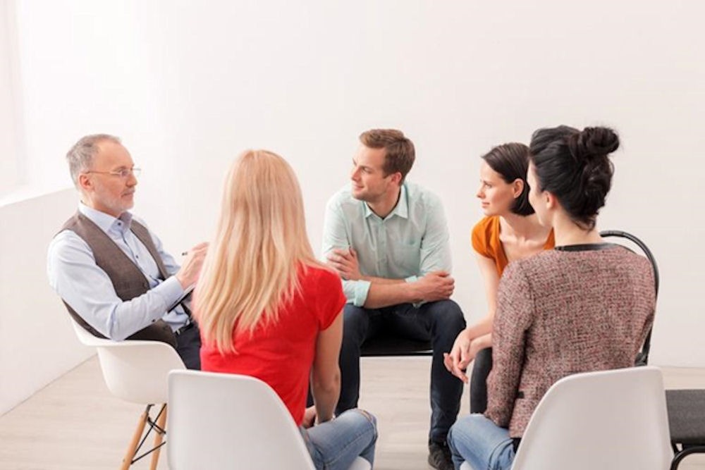 group of people on a therapy